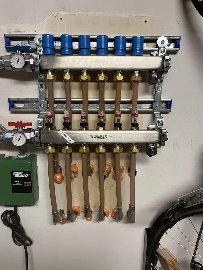 Plumber performing Water Heater Repair at a residential property in Pilesgrove